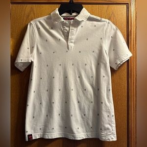 Boy’s Tony Hawk Short Sleeve Polo Shirt with Skulls Design.